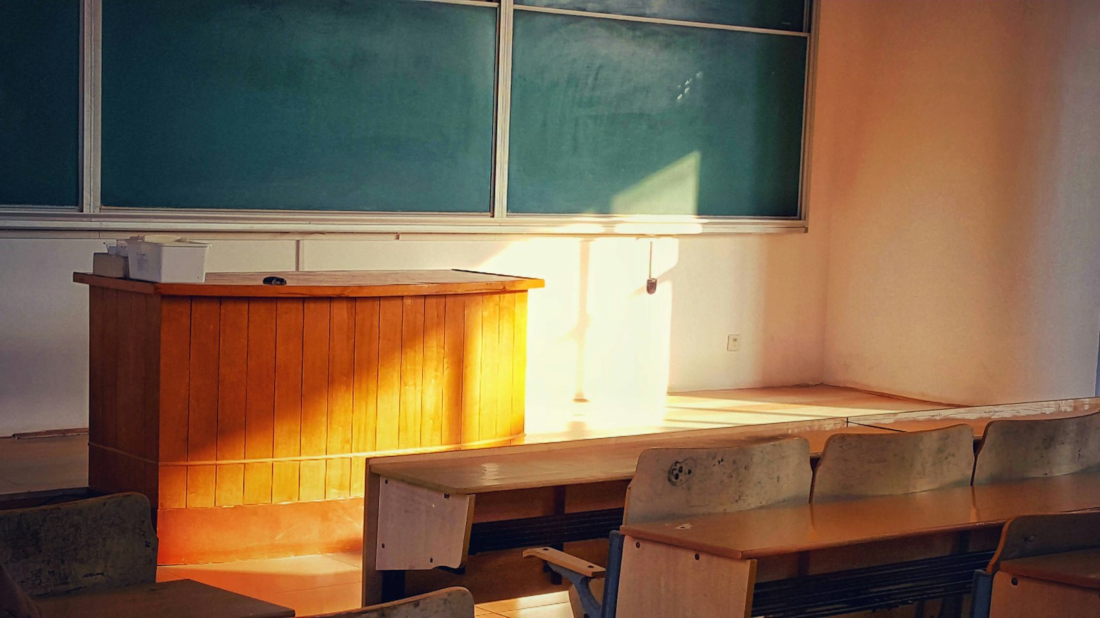 Empty classroom with school desks
