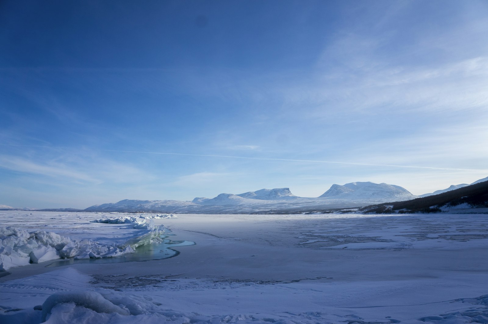 Snowy winter landscape with mountains near Abisko, Sweden